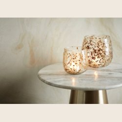 Fyrfadsstage med trrede blomster